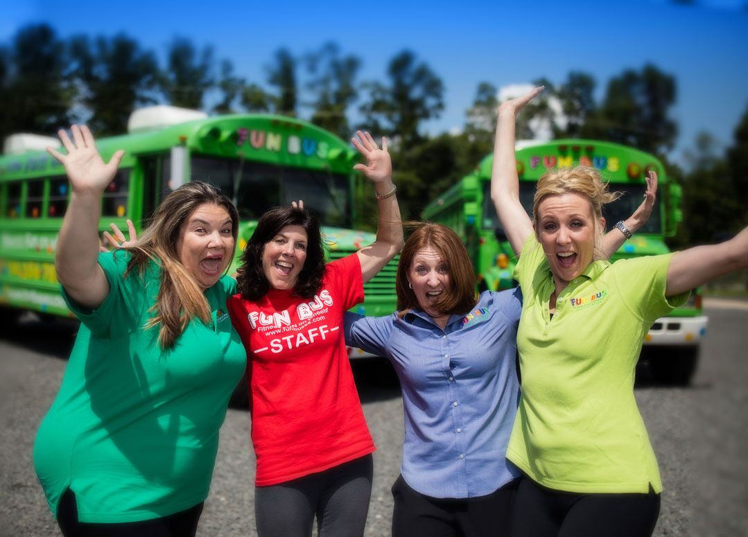 staff in front of kids party bus Old Bridge